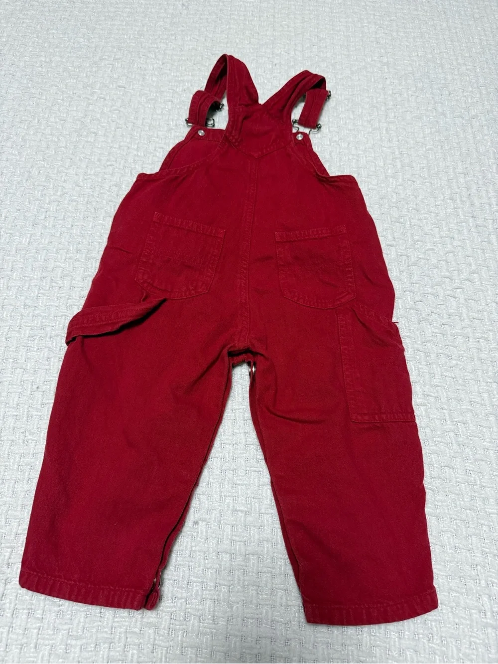 Red Alaska vintage overalls with embroidered moose and trees, 1 year.